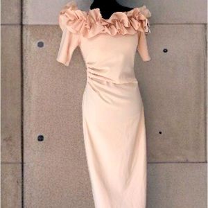 Mother of the Bride or groom.